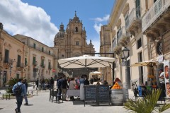 . View of the plaza in Ragusa with the Cathedral San Giorgio. in the distance.