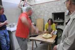 Next we all get a chance to learn how we make bread. We have to earn our meal.