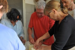 We squeeze and squeeze the product into the strainer container to make the product eventually  easy to remove.