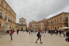 Piazza Duomo with the Church of Santa Lucia  in the distance. This baroque church features a painted ceramic floor & Caravaggio's "Burial of Saint Lucy."