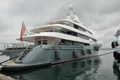 A mega yacht docked in the harbor of Ortigia.