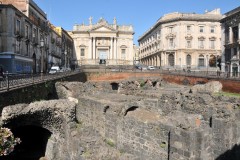 The Roman Amphitheatre of Catania was an imposing structure built in the Roman Imperial period, probably in the 2nd century AD, on the northern edge of the ancient city at the base of the Montevergine hill. Only a small section of the structure is now visible, below ground level, to the north of Piazza Stesicoro.