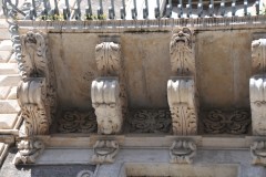 Animal faces  found under the balconies for support and ward off stange spirits.