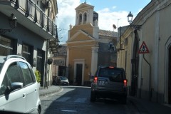 Driving the narrow roads on the side of Mt Etna through a small village.