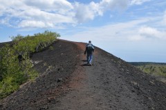 Climbing up to the top of a volcanic hill with in Mt.. Etna.