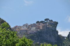 Settled on a hill of the Monte Tauro, Taormina dominates two grand, sweeping bays below and on the southern side, the top of Mount Etna, the European highest active volcano, often capped with snow, offering to the visitors a breathtaking, dramatic and memorable view over almost one hundred miles of Mediterranean sea.