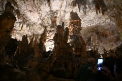 The cave system is 15.12 miles long long overall. Only  3 miles is open to the public. It is made up of four caves interconnected through the same underground river.