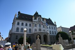 The building is the University of Ljubljana. It is one of the symbols of the city. Very close to the square are the markets, the additional bridges, the river promenade, restaurants and cafes. The place is usually crowded with tourists, but it is still one of the most magical places in the city. A great place to people watch. 