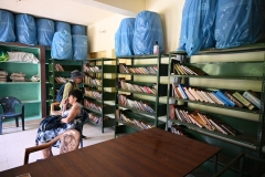 Inside the meager library which they are proud of. I do not remember seeing any electricity in the library. 