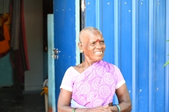 We were invited in to her home, a one room home.