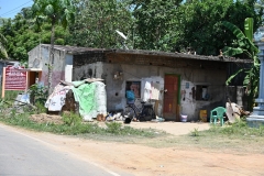 Walking past another village home