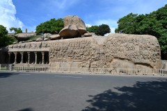 Descent of the Ganges, known locally as Arjuna's Penance, is a monument at Mamallapuram, on the Coromandel Coast of the Bay of Bengal, in the Chengalpattu district of the state of Tamil Nadu, India. Measuring 96 by 43 feet, it is a giant open-air rock relief carved on two monolithic rock boulders. 