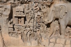 The elephants represent a herd moving towards the river to drink water. The male elephant carving precedes that of its female partner. 