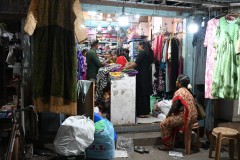 Ladies buying sari's, an long dress worn by most Indian women.