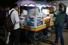 A chip wagon.. purchasing what we would call potato chips. 