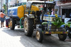 The tractor is even decorated for the holiday.