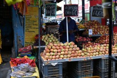 Apples displayed for sale along the street market