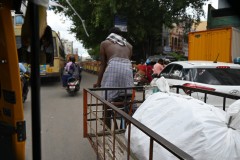 Bicycle delivery cart in street traffic