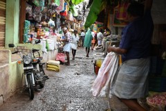 Note the numbers of locals barefoot without shoes or sandals. 