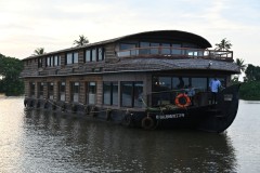 This is one of our two houseboats we are cruising for 2 nights. Each had 5 bedrooms, 3 downstairs and two up. A large dining room up stairs. a kitchen aft and  room at the front to just relax and watch the Kerala Backwaters float by. 