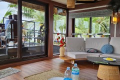 The forward section, a general area to relax and enjoy the scerery as it passes by, for everyone,  just behind where the pilot of the houseboat sits at the bow.
