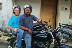 One of the most enjoyable  times of the whole trip for me occurred early the next morning when a group of young men "Youth of Cochin" was waiting for us at the hotel to take us through their city on motorbikes as the city wakes up. Meet my new friend Titan and his new Honda motorcycle he had.   