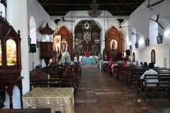 Inside the Church of Our Lady of Hope. A mass taking place.