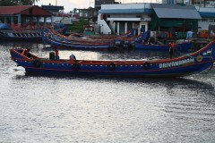 Fishermen in the evening getting their fishing boat ready for the next days catch.