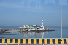 The Mosque Haji Ali Dargah is located on a small island in the Arabian Sea, in Mumbai.  The pathway leading to it gets submerged during high tide, making it accessible only during low tide periods. The Haji Ali Dargah was constructed in 1431 in memory of a wealthy Muslim merchant, who gave up all his worldly possessions before making a pilgrimage to Mecca. 
