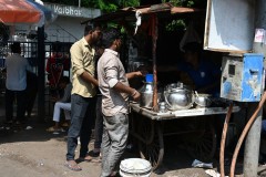 Hungry for lunch.  A local set up food to go. Instead of a drive through this is a walk by. 