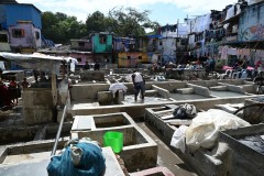  This photo says a lot of the Dhobi Ghat. You live and work all in the same location.  The wash tubs belong to the city and must be rented. The rent is 300 rupees a month, I am told the equivalent  $5.60. How much one earns depends on how many items are  laundered. Usually, on average about10,000 rupees a month. That’s $186 with long hours..
