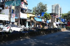 Homes and laundry business together just outside the Dobhi Ghat along the street