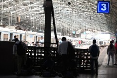 Trains arriving and departing every few minutes at the station.