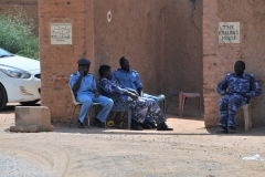 Across the street is Khalifa's House which holds a small museum about Mahdyia . Police guards sit outside the entrance to the Khalifa's House.