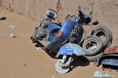 A former police motor scooter in ruins. When it falls apart in Sudan they leave it right where is stopped or collapsed.