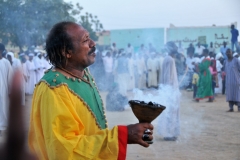 At the close of the ceremony, just before sunset, one of the dervishes walks round the gathered audience with frankincense - which is considered to be a type of blessing to the faithful.