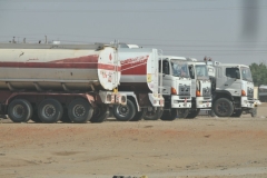 Huge tanker trucks carrying petroleum across the country.