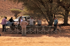 Picnic lunch under the shade of a tree in the mid day heat