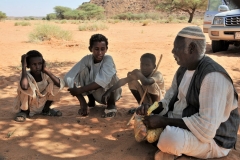 Locals waiting for food that we do not eat. We gladly give them all that is left over from the lunch. They are very grateful.