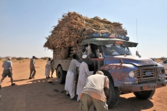 The truck breaks down and we all get out to jump start it by pushing. It worked.