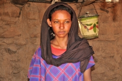 Young lady proud of her kitchen