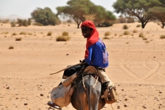 Young girl. We saw no men in camp during the day time hours. They were out with livestock