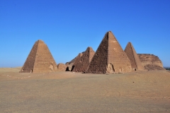 A group of eight well preserved pyramids of the Meroitic Kingdo, 3rd century BCE, in front of the Gebel Barkal mountain.