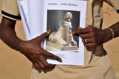 Statue of Ram. Also note the fingernails of Hameed. He is a newly weed less than a month. As part of the ceremony in Sudan the men have theire fingere nails and toe nails painted red. The brides have Henna painted on their hands and arms.