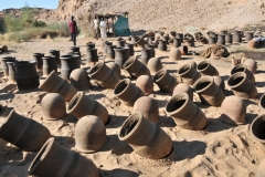 Making the large water pots by hand