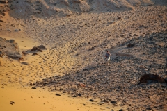 Carole Ann waiting at the bottom of Jebel Barkal