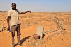 Hameed explaining the Muslim burial and grave marker