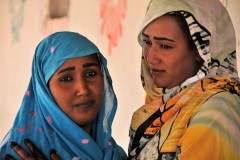 Beautiful wardrobe clothing worn by the ladies. Notice the henna on the hand. She has been in a wedding very recently.