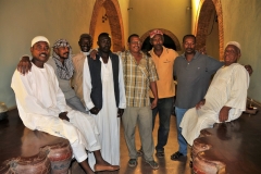 Group photo of Hameed, drivers and musican