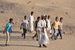 A group of locals walking through the area we were visiting